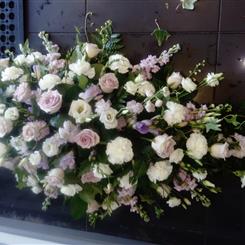 Lilac rose casket spray 