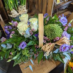 Flowers of the season basket arrangement 