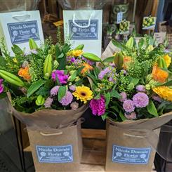 Vibrant florist choice handtied of beautiful flowers