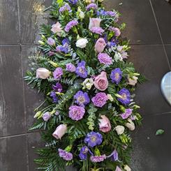 Lilac Rose and carnation casket spray