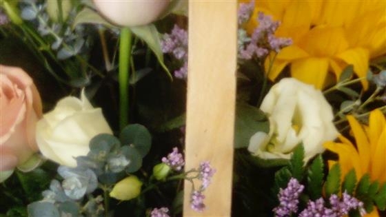 Sarah A sunflower and rose basket arrangement