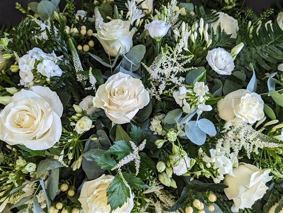 Cream rose and white Astilbe casket spray