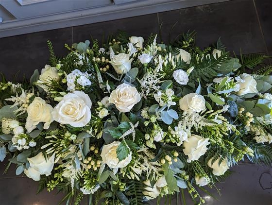 Cream rose and white Astilbe casket spray