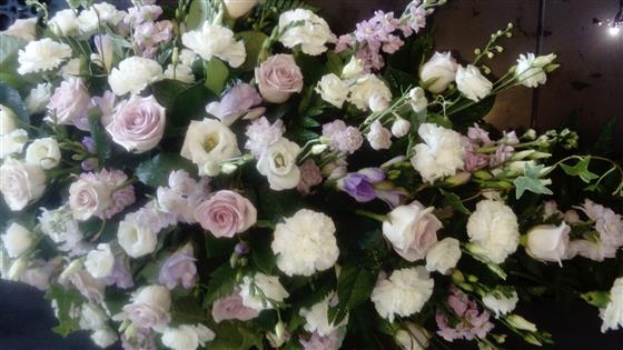 Lilac rose casket spray