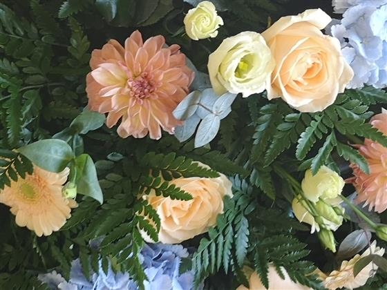 Peach and Blue casket spray