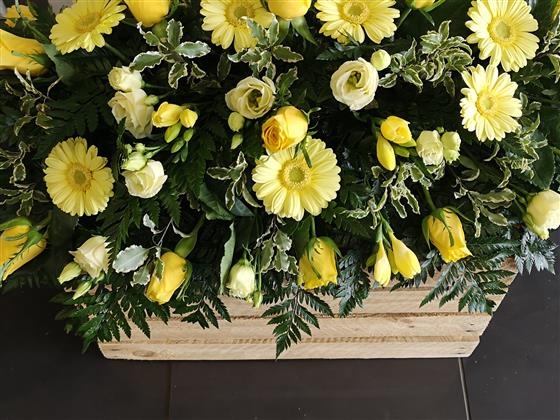 Yellow rose and gerbera casket spray