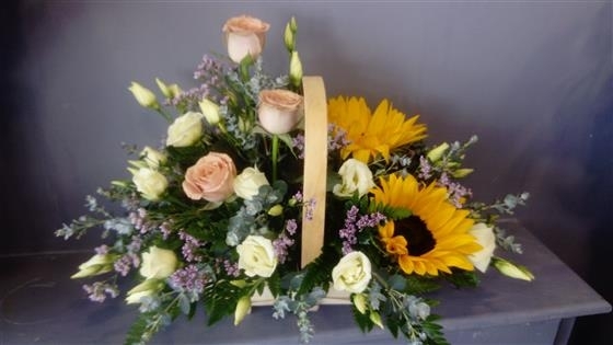 Sarah A sunflower and rose basket arrangement