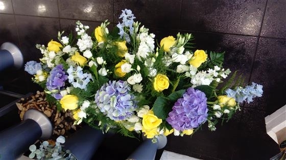 Blue hydrangea casket spray