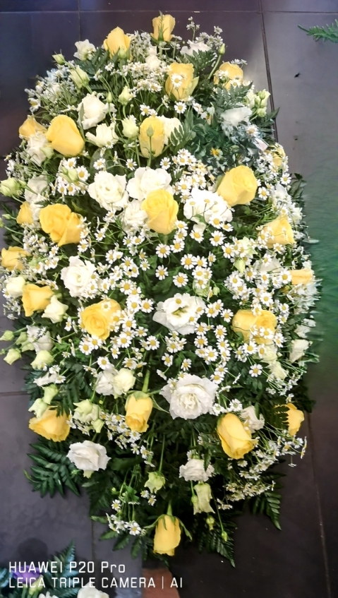 Buttercup Rose and White  Lizianthus Casket Spray