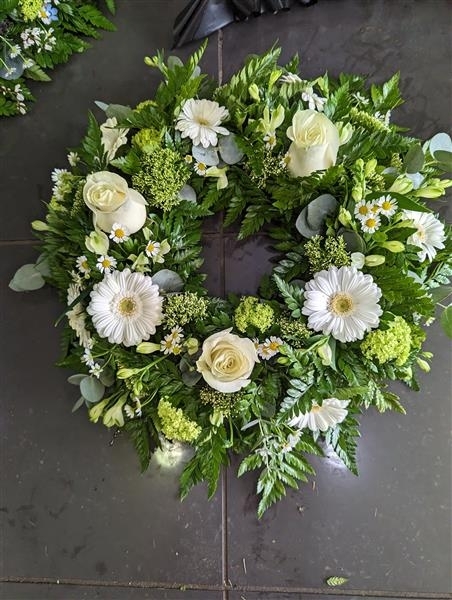 Cream rose and gerbera wreath tribute