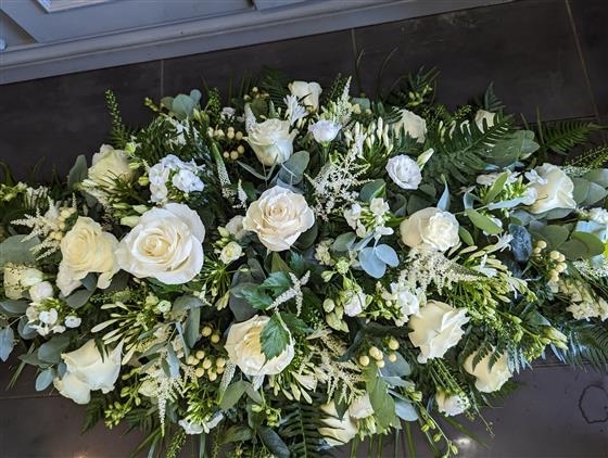 Cream rose and white Astilbe casket spray