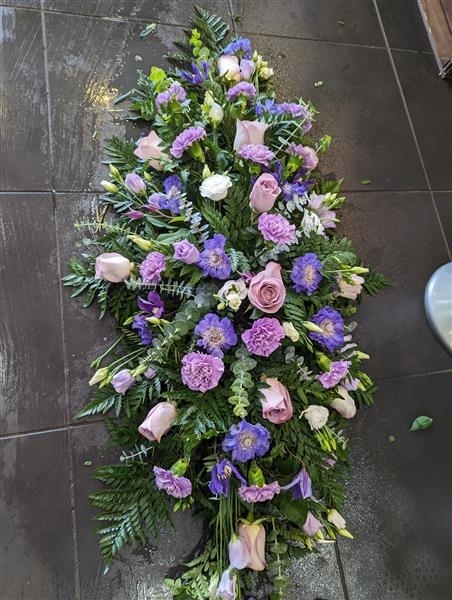 Lilac Rose and carnation casket spray