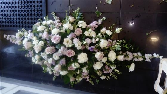 Lilac rose casket spray