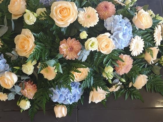 Peach and Blue casket spray