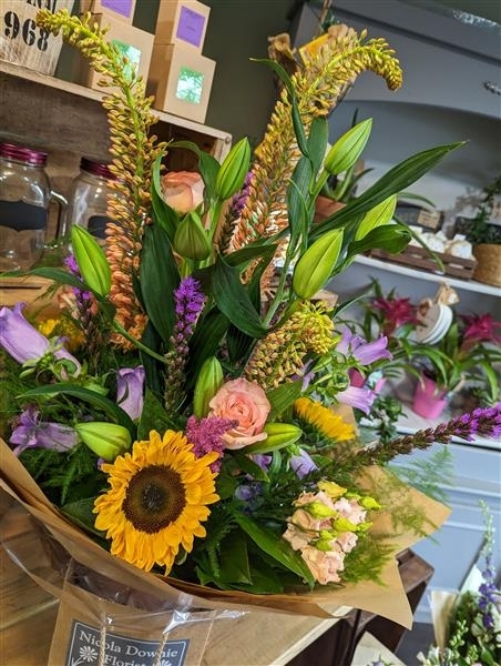 Ophelia A striking handtied of unusual bright blooms