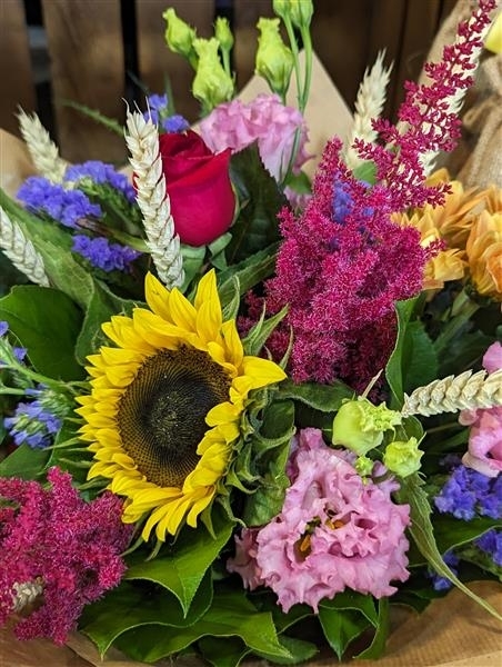 Clara A sunny collection of vibrant blooms